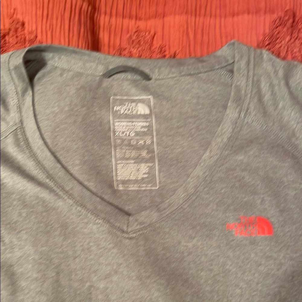 The North Face women’s Gray V-Neck Shirt